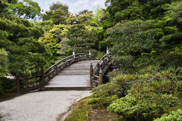 A bridge over the garden pond inside Kyoto Imperial Palace.  Kyoto Japan
