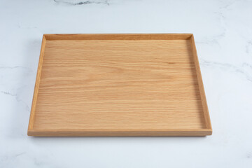 A view of a wood food tray.