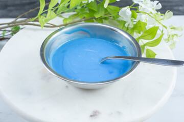 A view of a bowl of spirulina yogurt.