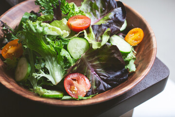 A closeup view of a salad bowl.