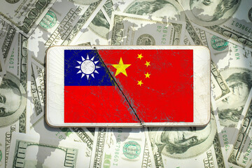 Taiwan and China flag icon patterns on the broken phone screen on a $100 dollar bill...