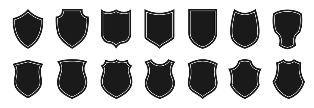 A set of vector badges and police stripes. Black isolated shields on a white background