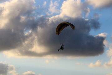 Paragliding in the sky over the Mediterranean Sea.