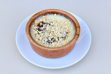 Baked rice pudding turkish milky dessert sutlac, keskul  (Turkish name; firin sutlac)