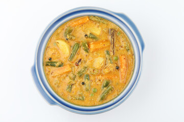 Kerala food -indian food spicy mixed vegetable curry Mix vegetable kurma - Indian recipe contains Carrots, cauliflower, green peas and beans, baby corn traditional
