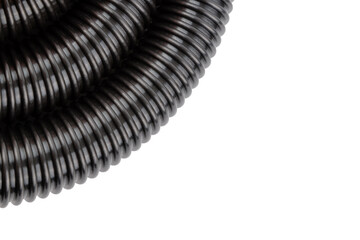 black plastic corrugated vacuum cleaner hose on white background.