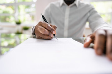 Agreement Form Signature. Hand Signing Paper