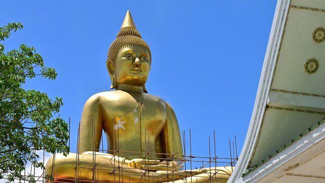 Buddha image of Luang Por Sothon, Wat Bosoth, on August 4, 2022, at Wat Bosoth, Sam Khok, Pathum Thani Province.Buddha statue behind the church