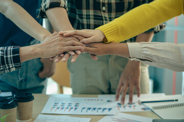 Fototapeta premium Businessmen shake hands after reaching an agreement and to expand business investment networks and create project development or employment and agreement ideas.