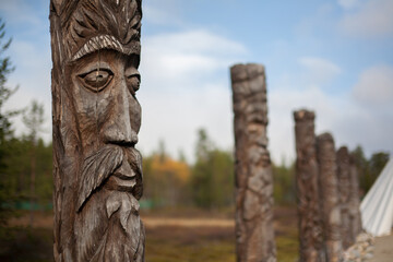 Alley of majestic idols at Sami Village, Murmansk, Russia, the four idola of elements (fire, earth,...