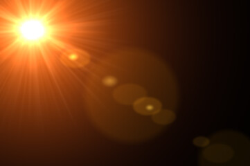 Lens flare and light beam on dark background orange color style. Abstract Natural Sun flare on black. Lens Flare ,Sun Flare on black background. Lens flare glow light effect