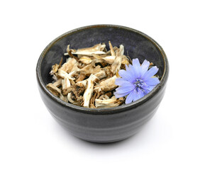 herbal medicine - dry ingredient chicory root, for the preparation of medicinal broth in a cup, isolated, white background - obrazy, fototapety, plakaty