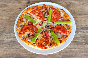 Delicious mixed pizza with rich content. Menu concept of choice and diversity. Karisik pizza