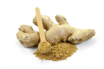 Ginger with dried powder over white background