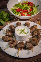 Recipe of kefta, beef skewer, Traditional homemade, with Greek yoghurt sauce, garlic, savory, Arabic and Libanese food, High quality photo