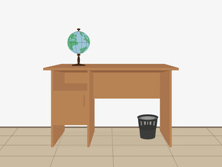 Brown office desk, the globe and waste paper basket indoors