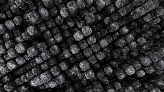 Abstract looping 3D animation of the moving weathered aged dark granite or rock or stone rectangular poles pattern rendered in UHD as motion background