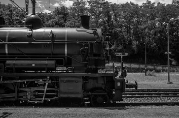 French old and vintage steam engine at the train station in Chagny, built in Le Creusot