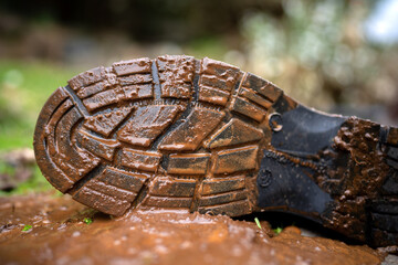 Muddy dirty boots in bio security on a farm in Australia 