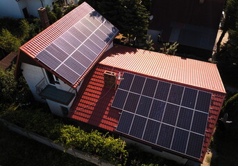View from the drone to photovoltaic panels on the roof - 521608764