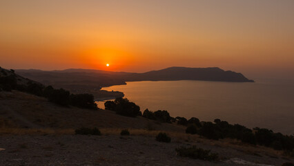 Dawn over the rocks and the coast of the Black Sea. Near Sudak