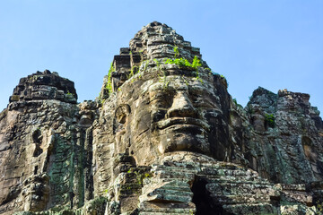 Fototapeta premium Statue at Angkor Thom on a sunny day, Siem Reap, Cambodia