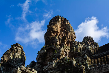 Fototapeta premium Statue at Angkor Thom on a sunny day, Siem Reap, Cambodia