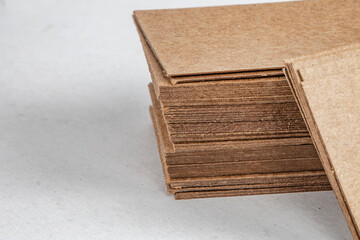 Cardboard Blank Visiting Card in Spiral Stack against plain background for card Mockup