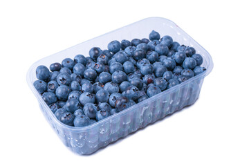 Blueberries in a plastic container isolated on white background.