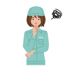 立って手をあごにあてて困っている作業員の女性