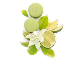 Citrus lime and green macarons on a white background.