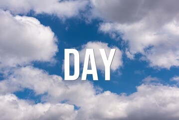 Fototapeta premium DAY - word on the background of the sky with clouds.