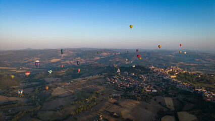 hot air balloons in the Umbrian skies
