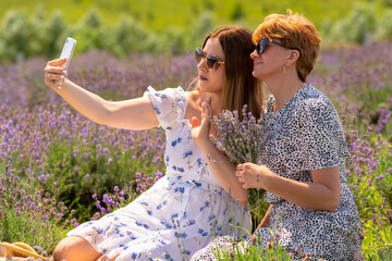 Two female friends having a video call on a mobile phone