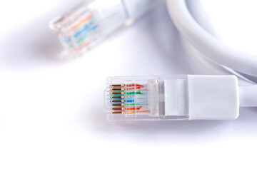 An image of computer network cable on white background