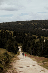 Mother and son on the walk in the mountains