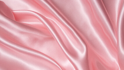 Smooth elegant pink silk or satin luxury cloth texture. Luxurious background design.