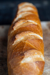 a whole wheat baguette, not cut into pieces
