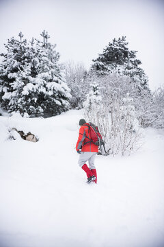 Man Hiking In Snowy Mountains In Winter, Bosnia And Herzegovina