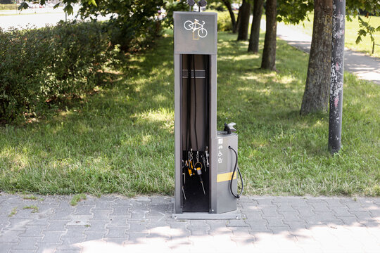 Automatic tire inflator for bicycle , this device is used to inflate the tyre with low air - Powered by Adobe