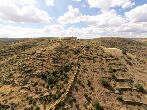 Aerial view of a walking path along Coa River in Vale de Afonsinho, Portugal.