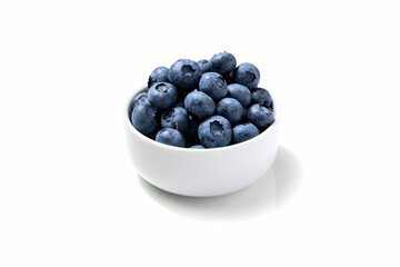 White bowl full of the blueberries