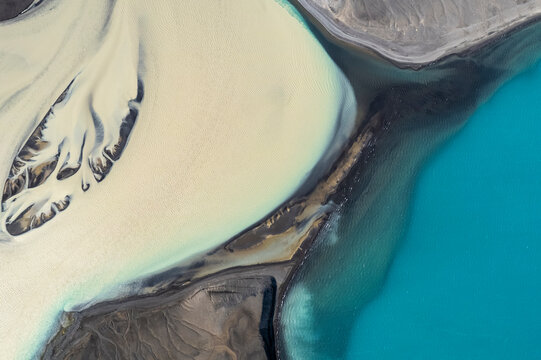 Aerial view of a water abstract pattern from a river estuary near Skyggnsvatn lake in Iceland.