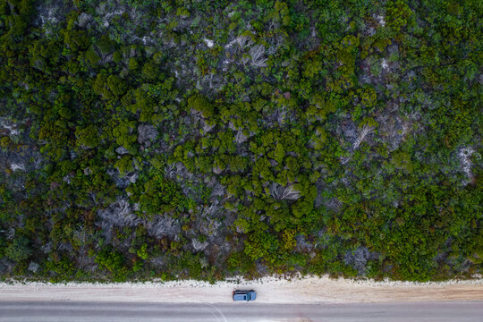 Aerial view of a car along the coastline in Wylie Bay Rock, Bandy Creek, Western Australia, Australia.