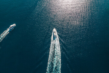 Aerial view of boats sailing in the bay in Porto Azzurro on Elba Island, Tuscany, Italy.