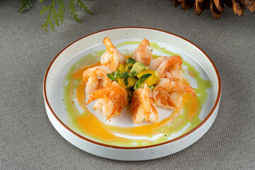 Shrimp and avocado salad. Fine dining restaurant, perfect display.