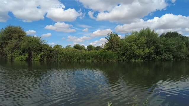 Timelapse shot of the flowing River Thames near Lechlade