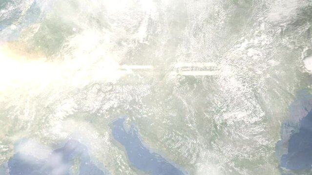 Earth zoom in from outer space to city. Zooming on Sopron, Hungary. The animation continues by zoom out through clouds and atmosphere into space. Images from NASA