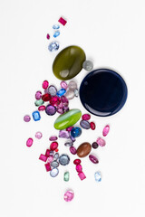 Synthetic Stones for jewellery making. Faceted colorful glass rhinestones on White