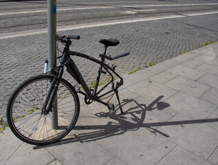 Obraz premium bicycle with parts stolen on the street